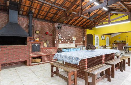 Guararema Casa | Piscina, jardim, área gourmet e vista arborizada