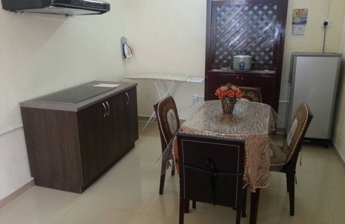 Kampung Bakau Apartamento | Pizzazz Q Holiday Apts (3 camas) 500MbpsWiFi 50 "SUHDTV
