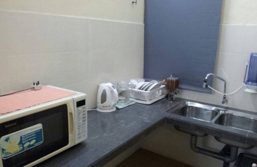 Kampung Bakau Apartamento | Pizzazz Q Holiday Apts (3 camas) 500MbpsWiFi 50 "SUHDTV