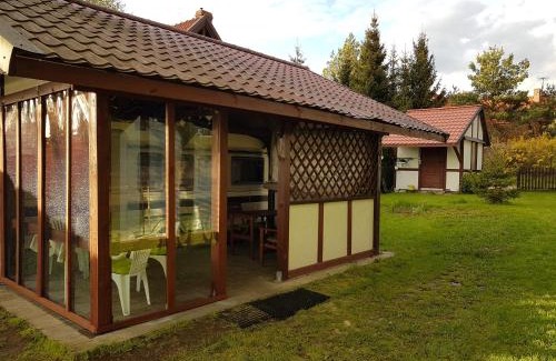 Stawiguda Otro | PlanB - przyczepa kempingowa we wsi Pluski nad samym brzegiem jeziora Pluszne