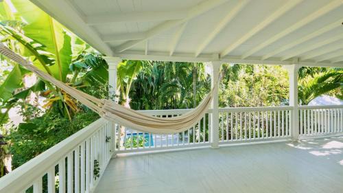 White St. Gallery Casa | Plantation Tropicale by Last Key Realty