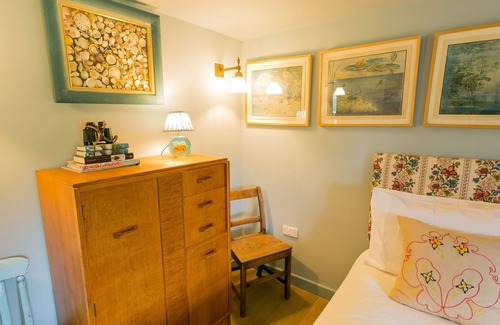 Rhoscolyn Cabaña | Plas Esgob - an on the beach that sleeps 8 guests in 4 bedrooms