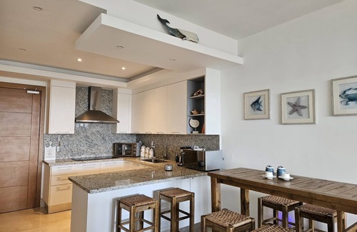 Residencial El Doral Apartamento | Playa Dorada: Cozy family friendly beachfront 3 bedroom /3 bathroom apartment.