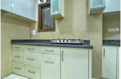 Block E Apartamento | Pleasant 3BHK Apartment Park Facing, Close to Market By HostMyStay