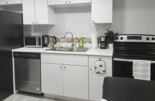 Brooklands Casa | Pleasant home with snazzy finishing. Proximity to the airport and downtown
