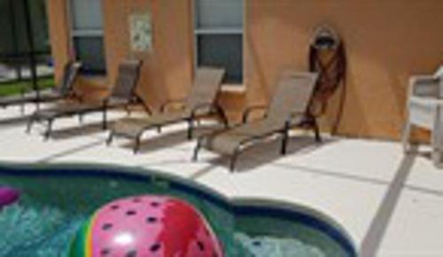 Sandy Ridge Casa | Pluto's Palace Florida Villa South Facing Pool