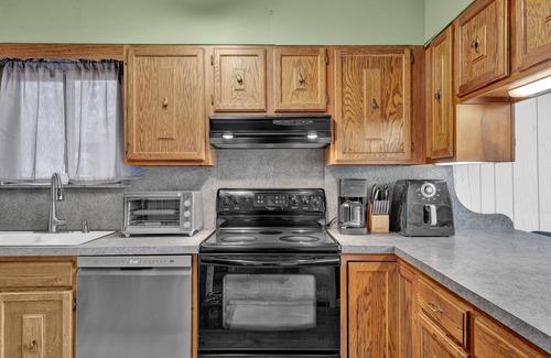 Paupackan Lake Casa | Pocono retreat with firepit, gameroom, expansive deck - dog friendly
