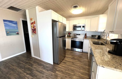 Placida Casa | Point Break: Gulf-front getaway with spacious porches overlooking the beach!