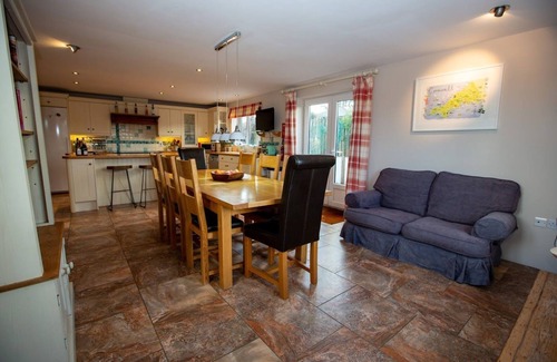 Trevone Casa | Polcarrek contemporary holiday home with parking and garden. Balcony with rural views