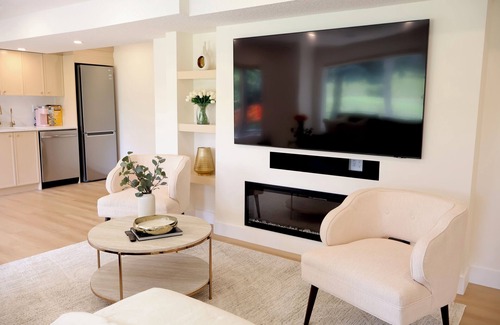 Valley Ridge Casa | Pond View 2 Bedroom Walkout Basement Suite on Golf Course with Fireplace & Sauna