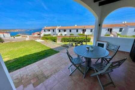 Arenal d'en Castell Apartamento | Ponent - Planta baja con vistas al mar y piscinas