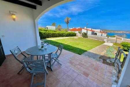Arenal d'en Castell Apartamento | Ponent - Planta baja con vistas al mar y piscinas