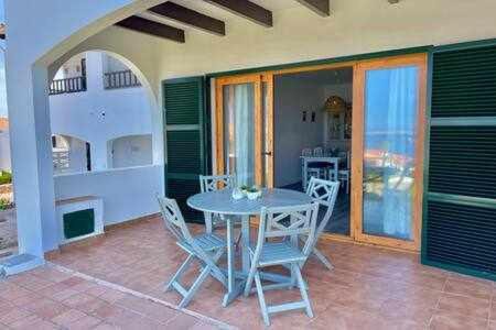 Arenal d'en Castell Apartamento | Ponent - Planta baja con vistas al mar y piscinas