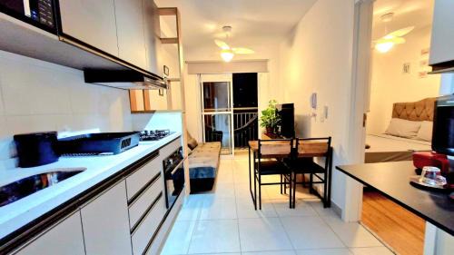 Panamby Apartamento | Por do sol desde uma rede na varanda da zona sul
