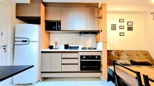 Panamby Apartamento | Por do sol desde uma rede na varanda da zona sul