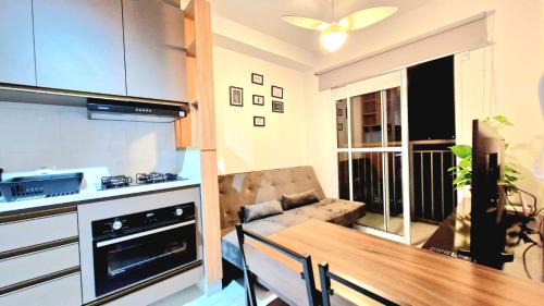 Panamby Apartamento | Por do sol desde uma rede na varanda da zona sul