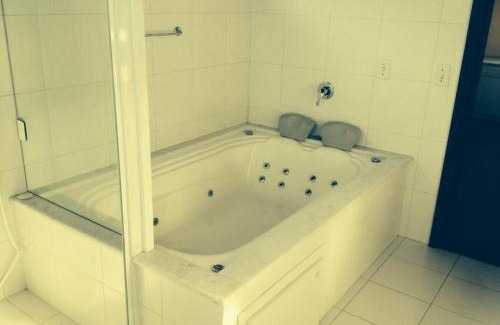 Praia do Rosa Apartamento | Pousada Águas de Ibiraquera Suite Master