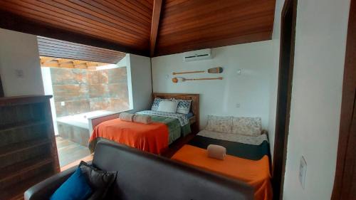 Sambaqui Casa | Pousada Águas de Ibiraquera Suíte Ribanceira