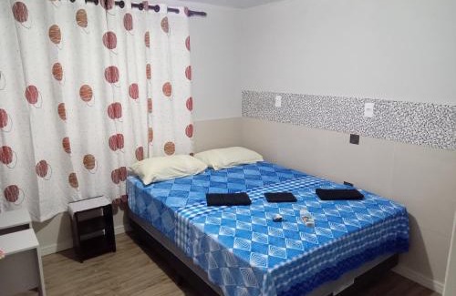 Lages Casa | POUSADA ALTERNATIVA MANU LAGES Quarto Com Banheiro no Corredor