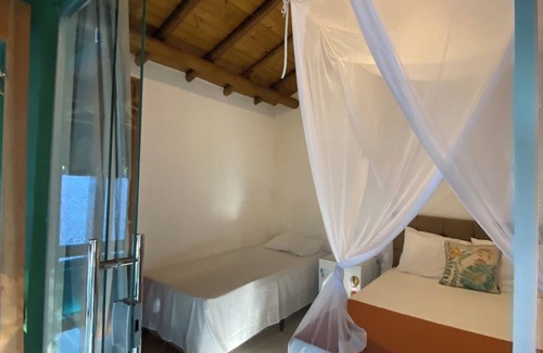 Arraial d'Ajuda Hotel | Pousada Casa de Sapê