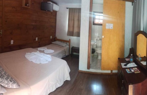 Bairro Lago Negro Hotel | Pousada Chalé das Neves