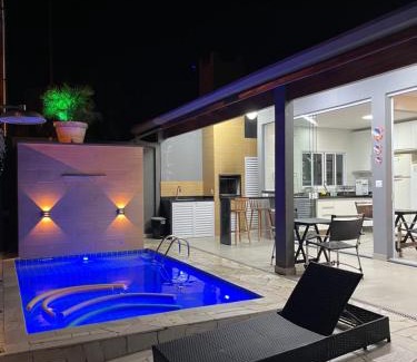 Sao Lourenco Casa | Pousada Riviera & Itaguaré com piscina climatizada!