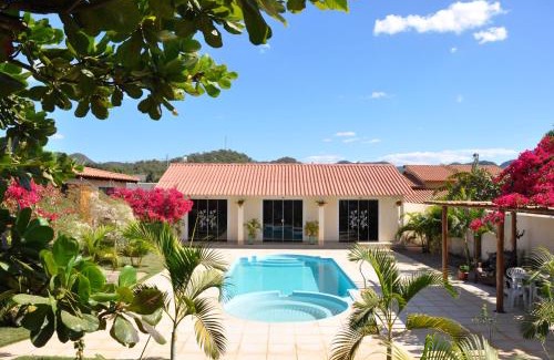 Cavalcante Casa | Pousada Suites Bougainville