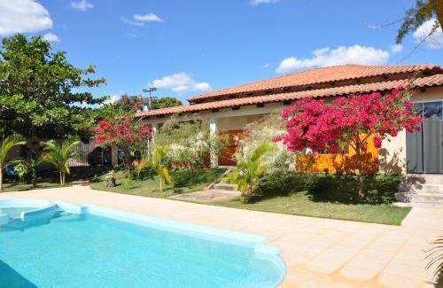Cavalcante Casa | Pousada Suites Bougainville
