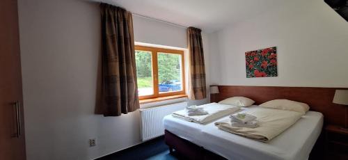 Lipno nad Vltavou Apartamento | Prémiový apartmán s privátní saunou a terasou v blízkosti Lipenské nádrže a lyžařského střediska