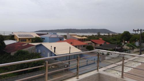 Palhoca Casa | Praia da Pinheira, alto padrão, 5 dormitórios, 4 BWC, climatizada 150 m praia