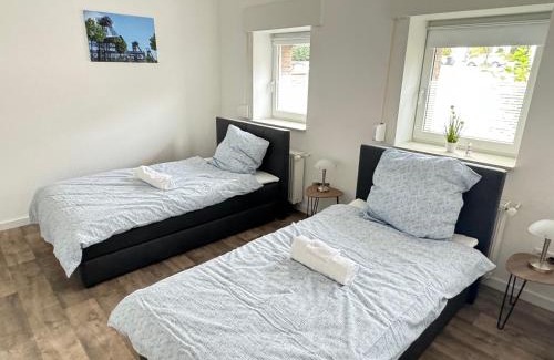 Hamm Apartamento | Premium 4 Bett Appartment ,WIFI, Waipu TV, Waschmaschine, Trockner, Küche in Hamm