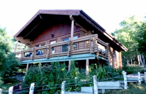 West Bay Casa | Casa de troncos con una vista panorámica fantástica.
