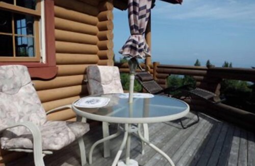 West Bay Casa | Casa de troncos con una vista panorámica fantástica.