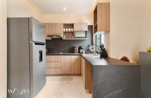 Área de la calle 12 Apartamento | Prime 5th Ave Stay - 4BR with King Beds & City Views