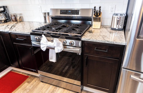 Weinland Park Casa | Pristine Mid Cen Mod Home I Game Room I Hot Tub on Terrace with City Views