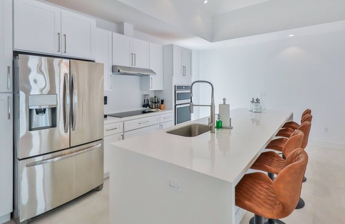 Alice Town Casa | Private 4 -bed home w/ dock facing the Hilton Hotel.