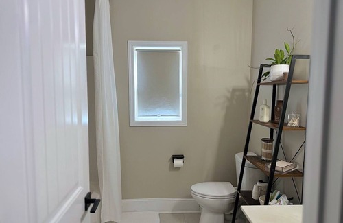 Grayson Casa | Private bed and bathroom with partition and own entrance..