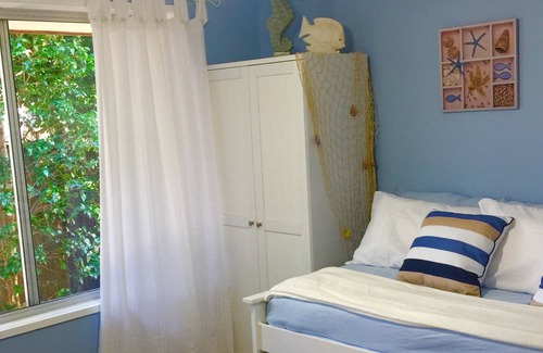 Currumbin Waters Casa | Retiro costero privado: exuberantes jardines tropicales, piscina privada con cascada