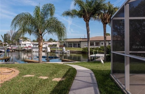 Flor-a-mar Casa | Private Home in desirable Gulf Harbors neighborhood