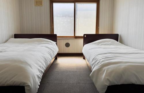 Tobetsu Apartamento | Private house Oheso 40minutes from Sapporo,4 free parking, long stay,16people