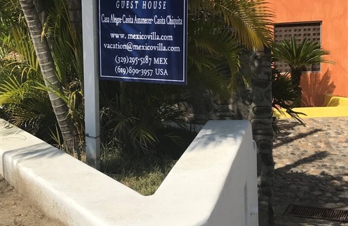 La Cruz de Huanacaxtle Villa | Habitación privada con cama doble, baño con ducha y patio
