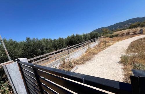 Amphipolis Otro | Private Parking for Cars, Vans, Campers, Bus, RV, Trailer & Caravan with Easy Access to Expressway & Main Road - Quiet Location with Mountain Views, Near the Beach, with 2 Lose Guard Dogs, No Water or Electric, No Shower or Toilet - Self Check-in