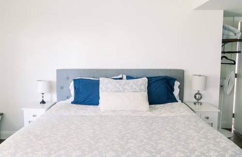 Goodville Otro | Private suite with kitchenette, bedroom, bathroom and patio.