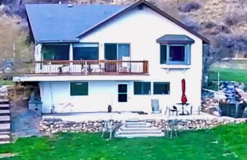 Great Falls Cabaña | Prolific View on River w/ Hot Tub. Fishing Boat available. Golf. 7.5 acres