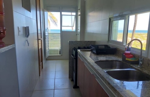 Praia do Baixio Apartamento | Property standing in the sand