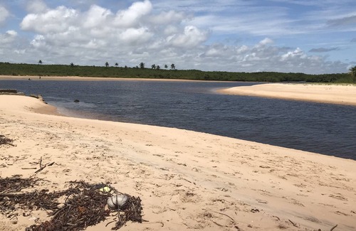 Praia do Baixio Apartamento | Property standing in the sand