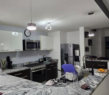 Puerto Aventuras Apartamento | Puerto Aventuras Apartment wifi pools barbecue family