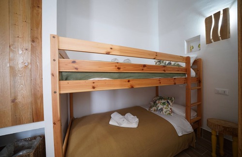 Pulsano Cama Y Desayuno | Pumo room symbolizing fertility, abundance and prosperity