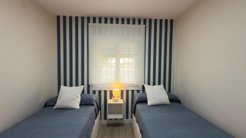 Poblado de Sancti Petri Apartamento | Punto Mágico, apartamento junto al mar