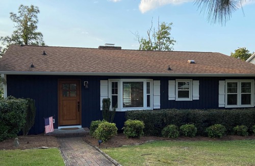 Olivia Casa | Put your feet up, relax and unwind on the screened porch or go jump in the lake!